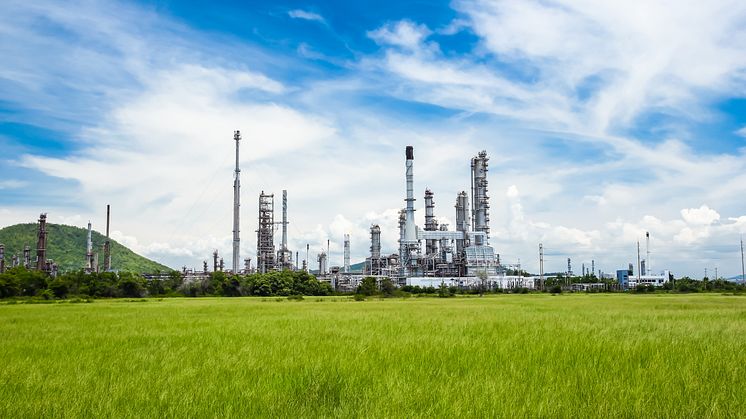 Refinery in the green with blue sky - Tungphoto_Shutterstock_125837234