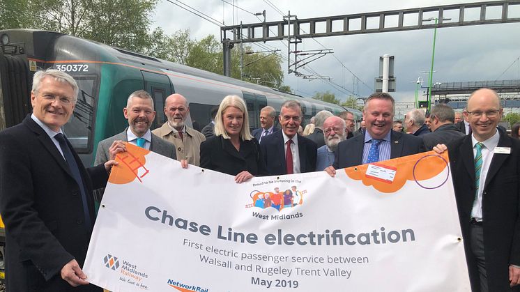 Rail Minister Andrew Jones (far left) and local partners and stakeholders at Rugeley Trent Valley station, following the inaugural electric passenger service from Walsall on 10 May 2019