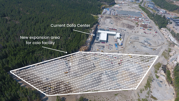 Drone footage of the area where new colocation will be built. Current data center in the background.