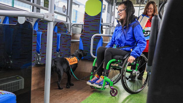 Local bus user Grace with assistance dog Star