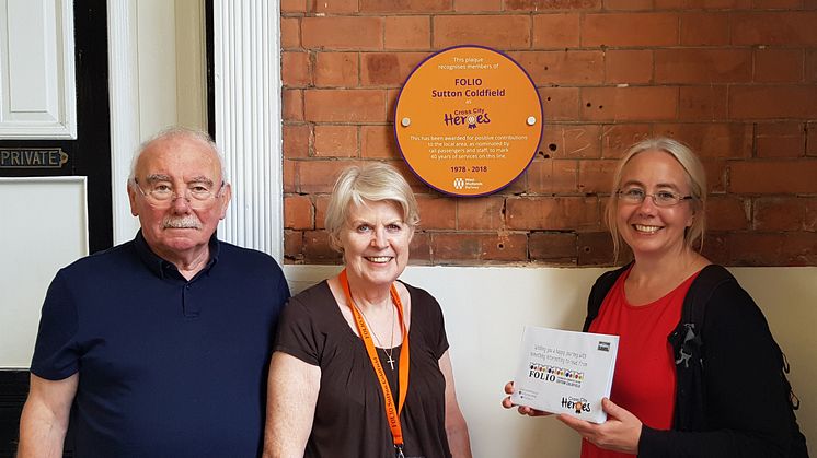 John Cooper (FOLIO Trustee), Noran Flynn (FOLIO trustee) and Zoe Toft (FOLIO Trustee) with their Cross City Heroes plaque at Sutton Coldfield station