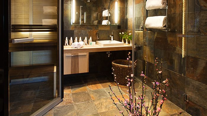 Bathroom with sauna in earthy colours