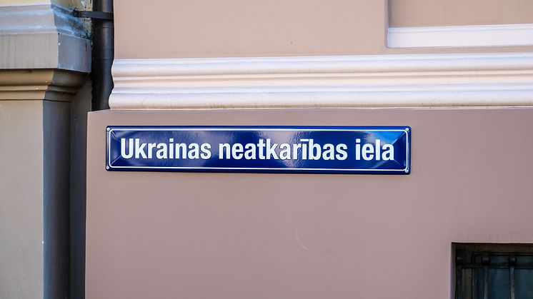 Street sign with the inscription Ukrainian Independence Street in the center of Riga. Shutterstock