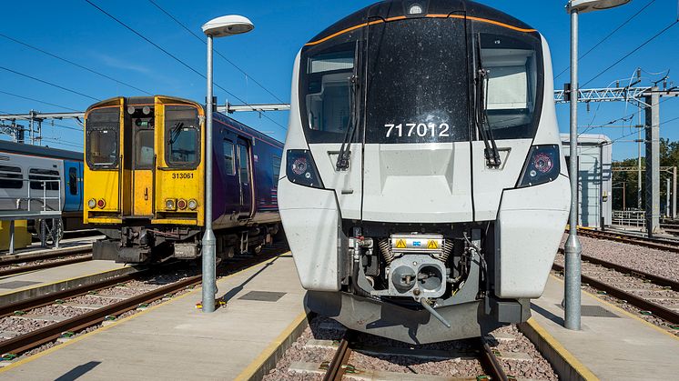 Old meets new: The Class 313 has now been removed from traffic as GTR completes its £2bn rolling stock programme