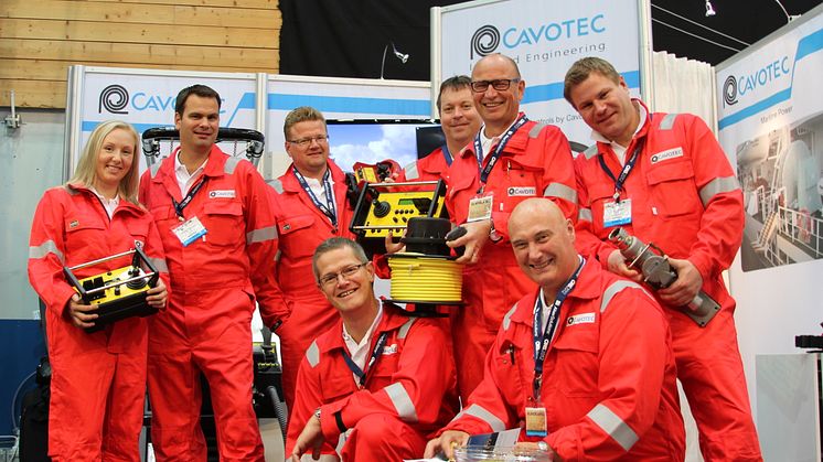 The team (and equipment) at the Cavotec stand - 290/7 in Hall B - at ONS2012