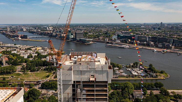 34 flags for 34 nations which work together on the construction site in Amsterdam North.