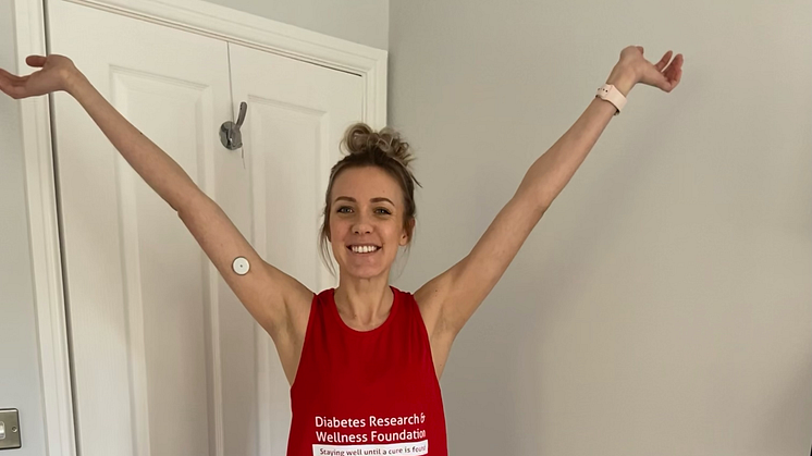 Type 1 Diabetes Hannah Barrett in her DRWF Running Vest Preparing For Cardiff Half Marathon.