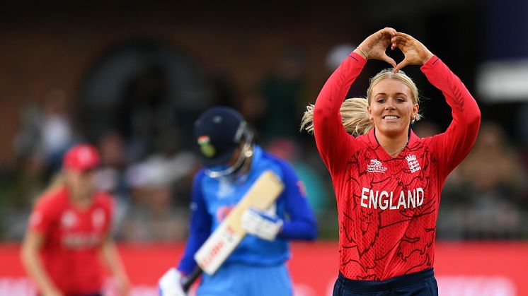 Sarah Glenn celebrates taking one of her two wickets