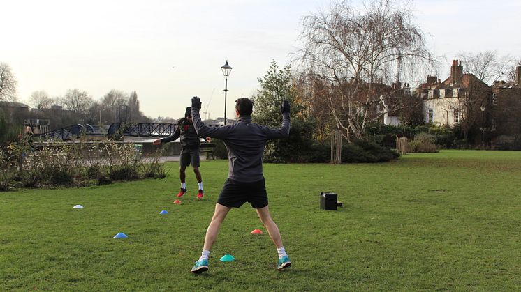 An activity session takes place in a park close to the Thames