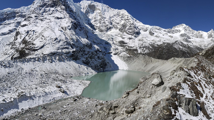 Dig Tsho glacial lake in the Langmoche valley, Nepal. The natural moraine dam impounding this lake breached catastrophically in 1985, causing extensive damage downstream.