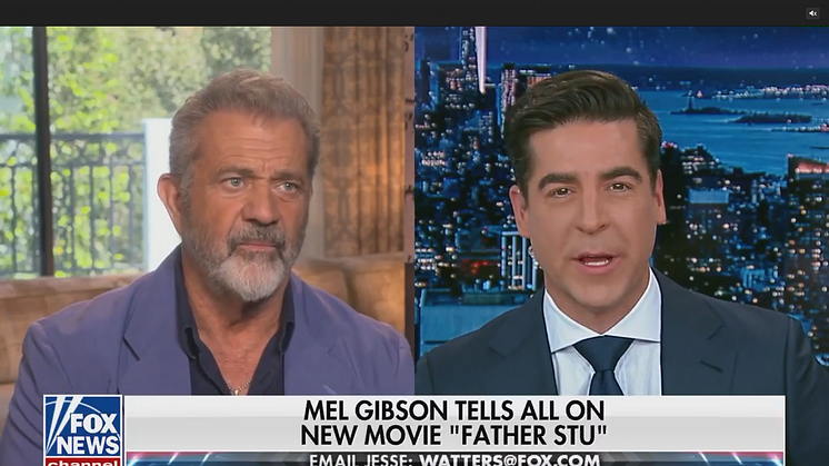 Celebrity Mel Gibson being interviewed by Fox News anchor Jesse Watters