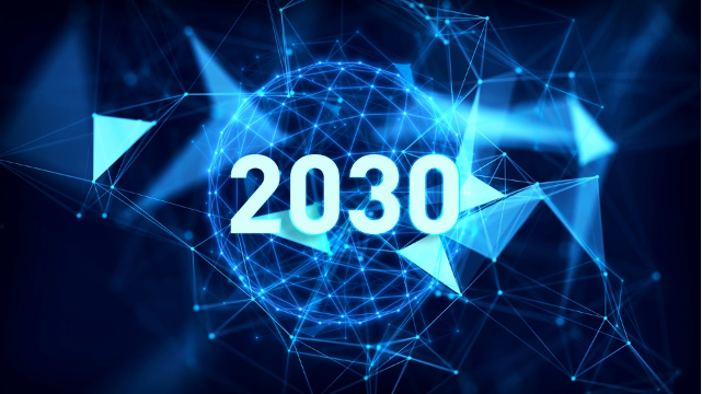 A geometric globe with the number '2030' illuminated in front of it. Royalty-free stock photo ID: 1900091095.