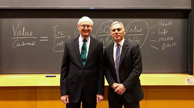 Michael Porter, Harvard Professor and Founder of Shared Value with Adrian Gore, Discovery Chief Executive.