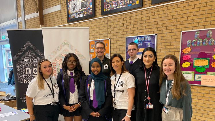 ng homes staff gather with staff and students from All Saints Secondary at their careers morning