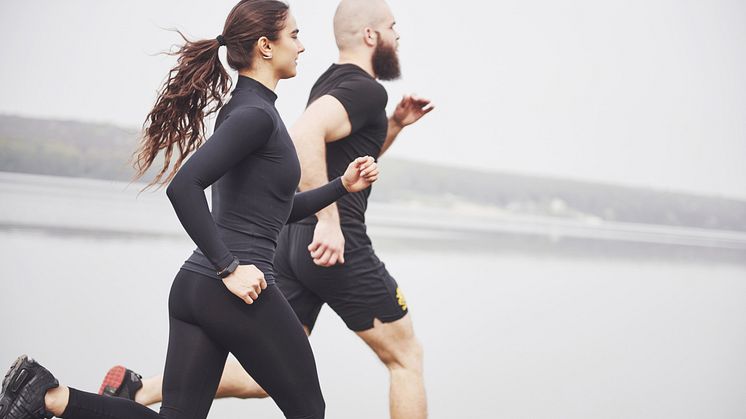 couple-jogging-running-outdoors-park-near-water-young-bearded-man-woman-exercising-together-morning