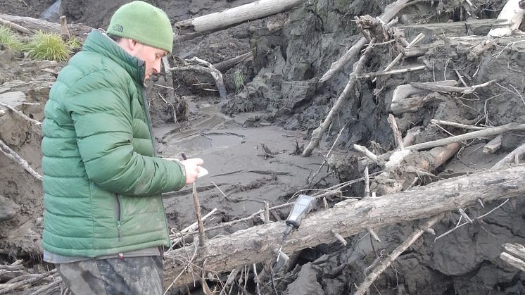 Dr Paul Mann taking samples of permafrost