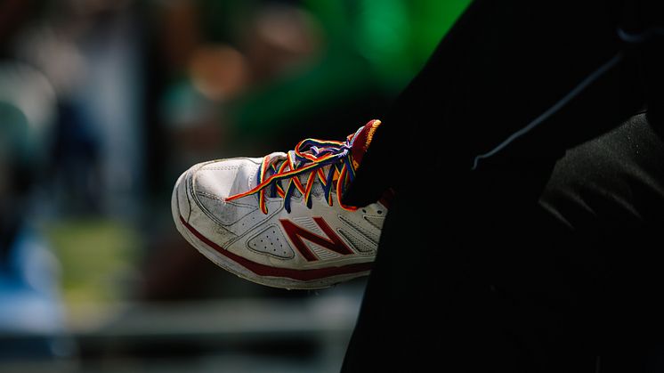 A cricketer with the Rainbow Laces in their spikes. Photo: Tom Shaw/ECB Images