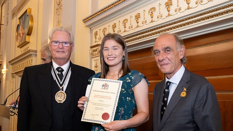 Laura Watson with Master Glover Clive Hawkins (left) and Robert Yentob, Chairman of Dents of Warminster and holders of the Royal Warrant.