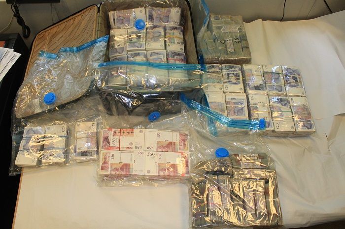 £1.5m cash seized and 13 arrested on suspicion of money laundering
