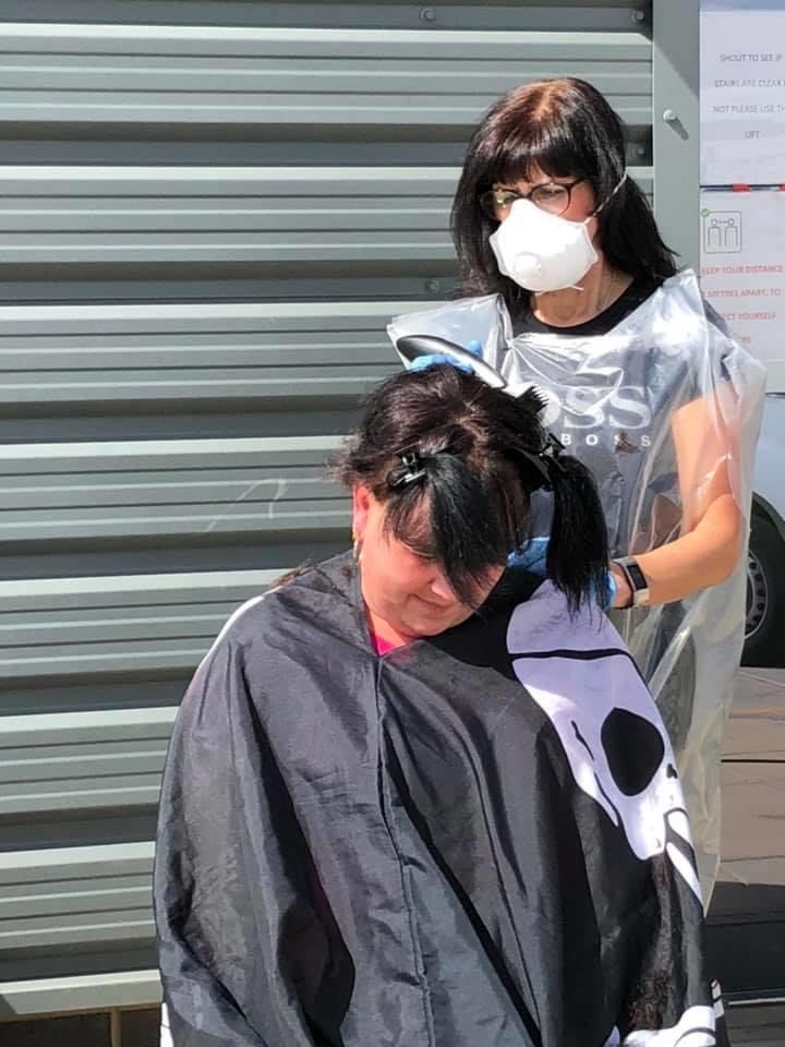 Go North East bus driver Julie Ede having her hair shaved off to raise funds for University Hospital of North Durham's children's ward