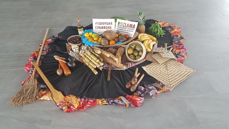 The opening ritual of an event includes an offering of local fruits and products, musical instruments, handicrafts and tools