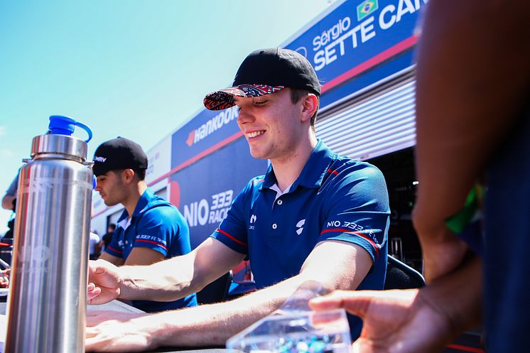NIO333 race team drivers stay hydrated while signing autographs at the Cape Town BB FIA Formula E World Championship 
