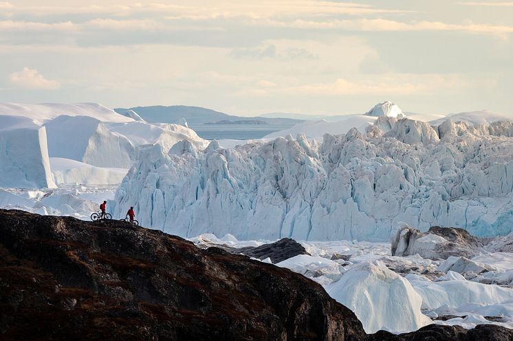 Ilulissat - Two Mountain Bikersat icefjord. Photo - Ben Haggar, Visit Greenland